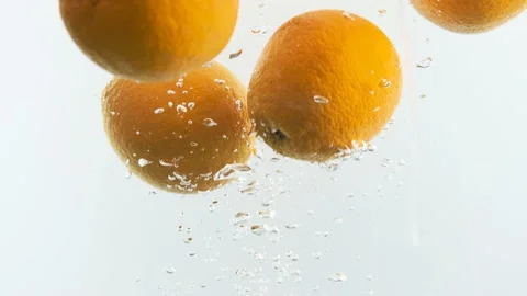 Oranges in the water. Lots of oranges. Stock Footage 142314564