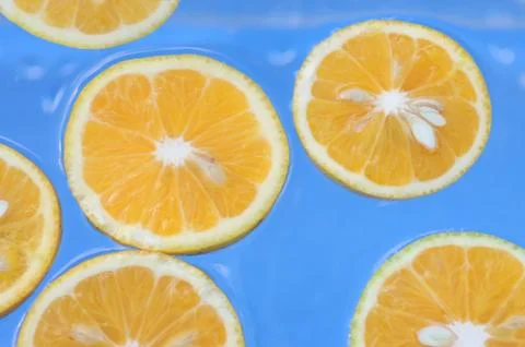 Oranges in water Stock Photos