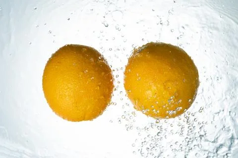 Oranges Water Splash Stock Photos