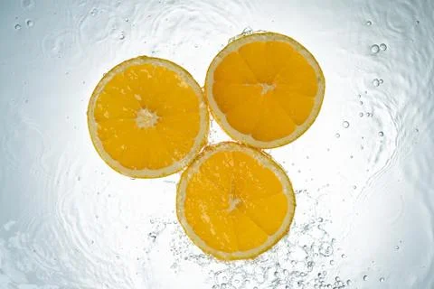 Oranges Water Splash Stock Photos