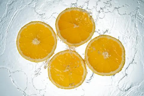 Oranges Water Splash Stock Photos