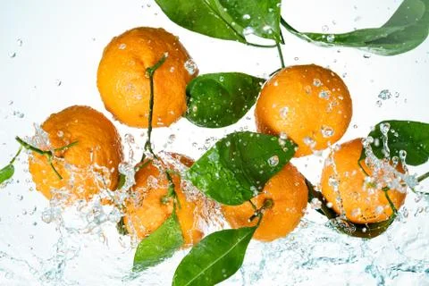 Oranges Water Splash Stock Photos