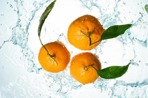 Oranges Water Splash Stock Photos