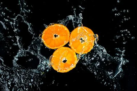 Oranges Water Splash Stock Photos