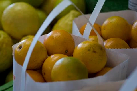 Oranges in a white bag Foto stock