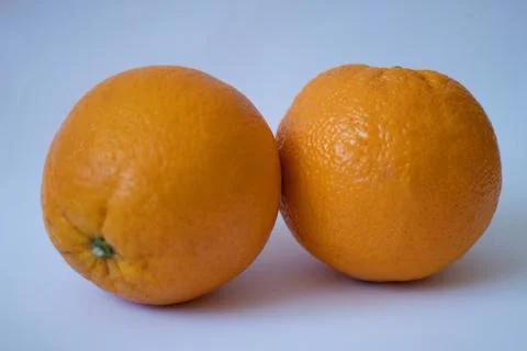 Oranges on a white isolated background Stock Photos