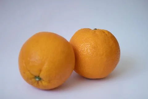 Oranges on a white isolated background Stock Photos