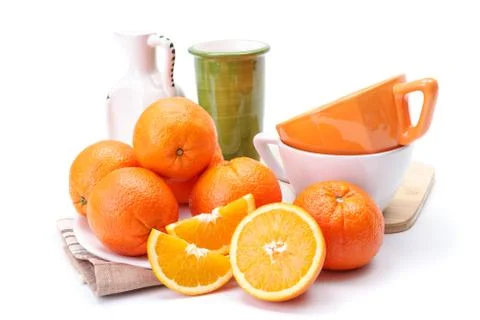 Oranges on white plate Stock Photos