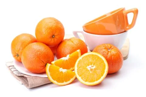 Oranges on white plate Stock Photos