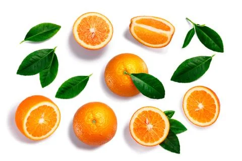 Oranges, whole, split, leaves, paths, top view Stock-Fotos