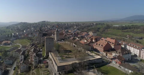 Orbe esplanade to center pass flight - Aerial 4K Stock Footage 105413093
