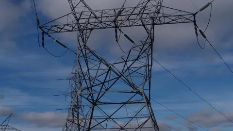 Orbing around power line tower Stock Footage 169978197