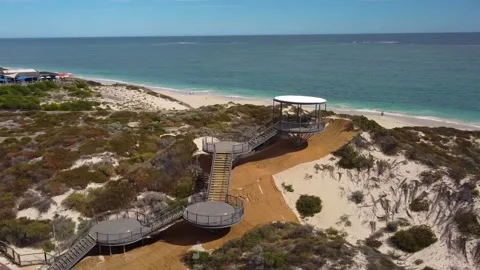 Orbit around Amberton Beach lookout Tower with beach bar in background Stock Footage 276973853