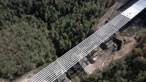 Orbit around bridge under construction Stock Footage 294040906