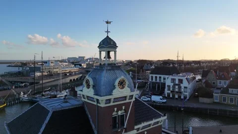 Orbit around old harbormaster tower toward new control building Stock Footage 331843805