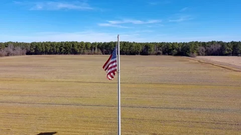 Orbit Around a US Flag in Wind Stock Footage 330056863