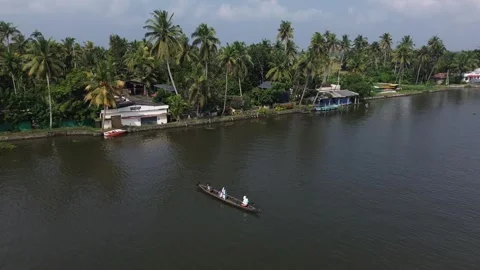 Orbit drone shot above local boat in Alleppey India Stock Footage 256651206