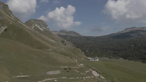 Orbit drone shot around a Hut in the mountains Video stock 230164583