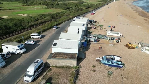 Orbit Drone Shot of Beach Huts, Pevensey Bay, England Stock Footage 303282256