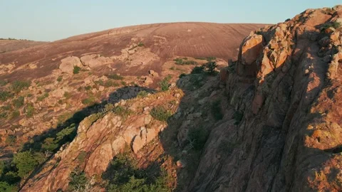 Orbit Drone Shot Of Enchanted Rock and Turkey Peak, Fredericksburg, TX [4K] Stock Footage