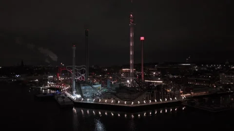 Orbit Drone Shot of Gröna Lund Amusement Park at Night, Stockholm, Sweden Vídeo Stock 330141094