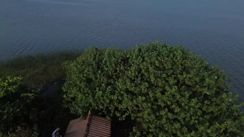 Orbit drone shot kayaking in Varkala India Stock Footage 256651826