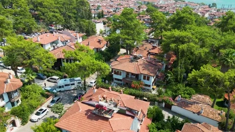 Orbit Drone Shot of Traditional Architecture Houses in Akyaka Turkey 16 Aug 2023 Stock Footage 329377659