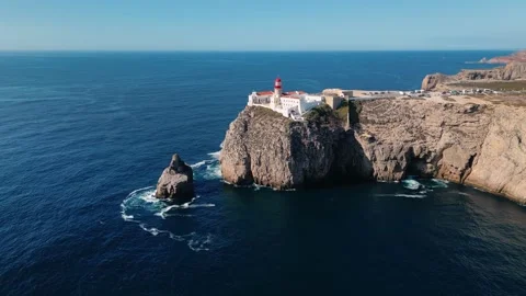 Orbit Drone Video of Cabo de São Vicente, famous lighthouse in Algarve Stock Footage 257063138