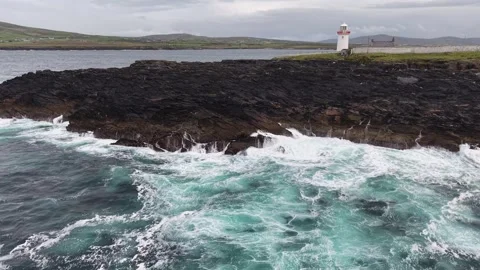 Orbit flight around the Ballyglass Lighthouse, County Mayo, Ireland. Stock Footage 342736220