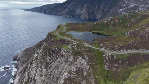Orbit flight around a mountain lake, Ireland Stock Footage 342713471