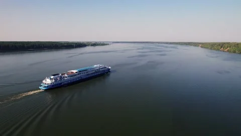 Orbit flight around stern of big passenger ship on the river Stock Footage 219568160