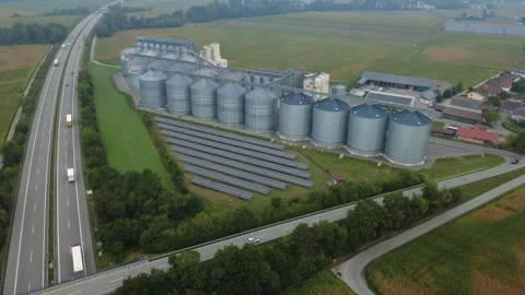 Orbit of Grain Storage Silos and Solar Farm with Grazing Sheep – Bavaria Video stock 343890102