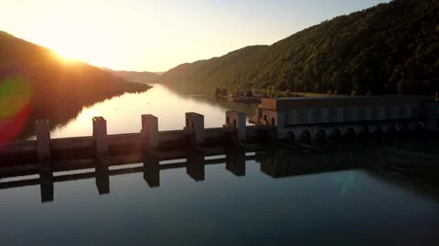 Orbit of a hydropower plant on the river Danube against the setting sun Vidéo 340791509