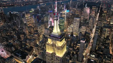 Orbit Left Above the Empire State Building and the Lit Grid Stock Footage 345289591