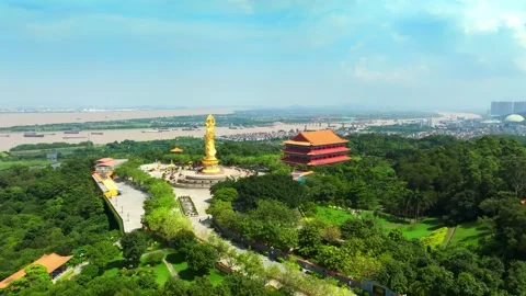 Orbit over the circular Guanyin statue plaza in Guangzhou China Stock Footage 345958786