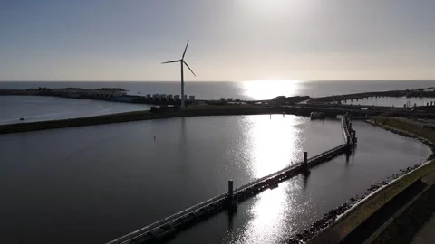 Orbit over lock complex and power structures at sunrise Stock Footage 331838788