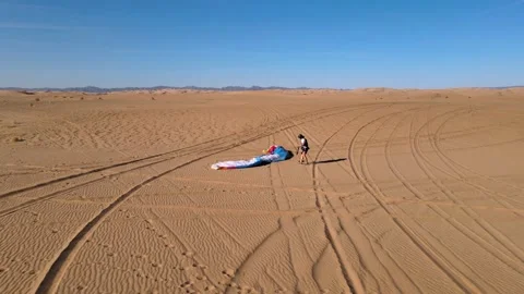 Orbit Paramotor Pilot Setting Up Wing Stock Footage 165485859
