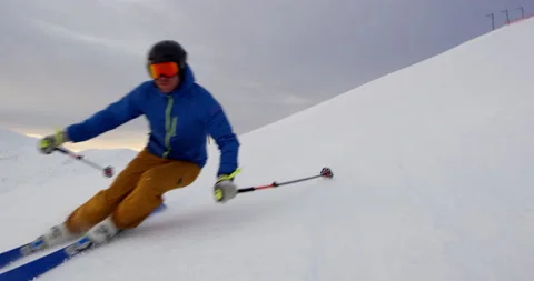 Orbit Shot Of Someone Skiing During Sunset Stock Footage 140190184