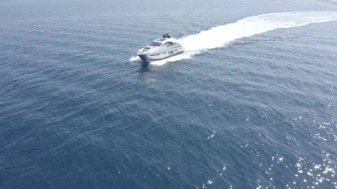 Orbit Tracking Drone Shot Around Luxury Motor Yacht on Open Sea Stock-Footage 344039801