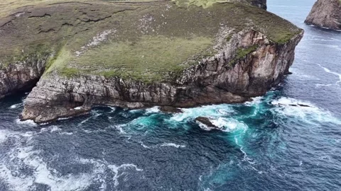 Orbit view of the Eire 63 Sign, near Portacloy, Ireland. Stock Footage 342665219