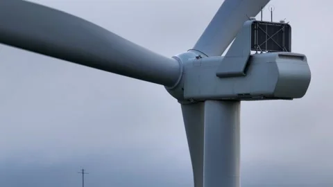 Orbit of Windfarm turbines rotating in the wind Stock Footage 247670293