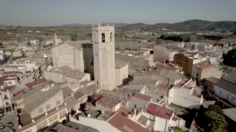Orbital Drone 4K flight towards the Arciprestal Church of Sant Mateu and its Stock Footage 296733916