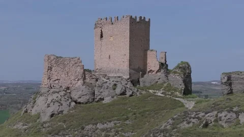 Orbital flight over the castle of Oreja 9th century in the foreground the Stock Footage 275159529