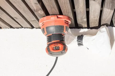 Orbital sander electric profession tool equipment construction site front vie Stockfoto's