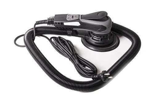 An orbital sander is placed on a plain white background. This tool is used fo Stock-Fotos