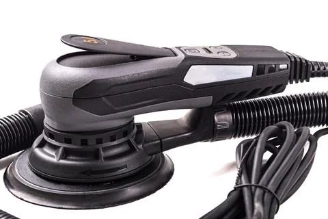 An orbital sander is placed on a plain white background. This tool is used fo Foto stock