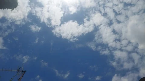 Orbital View of Sunny Cloudy Sky 動画素材 296804695