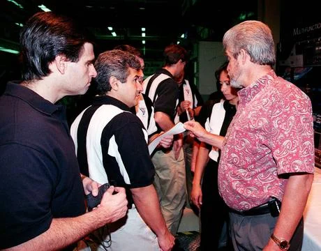In the Orbiter Processing Facility bay 3, Larry Osheim (right), who is wit... 스톡 사진