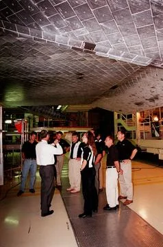 In the Orbiter Processing Facility, members of the 1998 astronaut candidate.. 스톡 사진