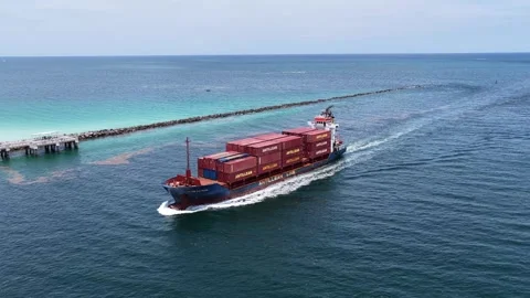 Orbiting aerial of Antillean Line ship passing Government Cut jetty Vídeo Stock 342646486